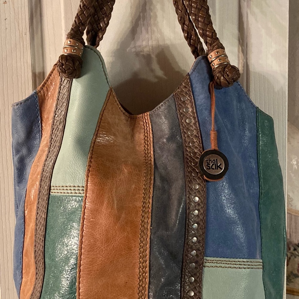 Leather bucket bag by The Sak.